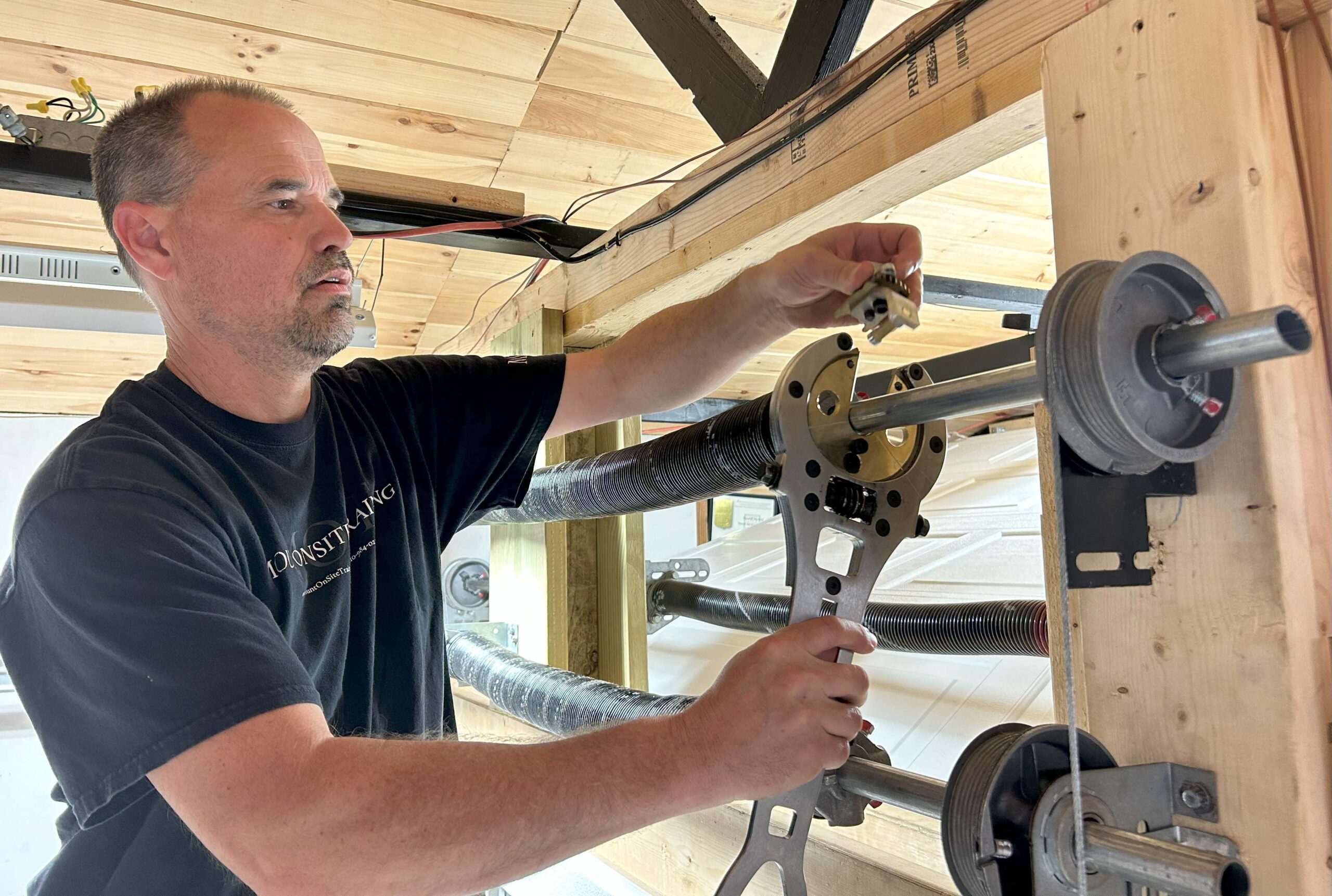 Dave instructing in front of brick wall